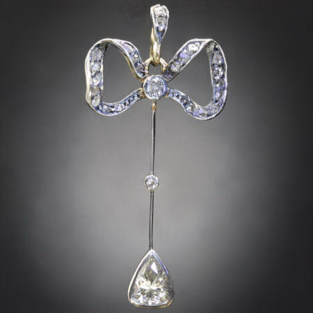 Victorian bow pendant with pear shape diamond